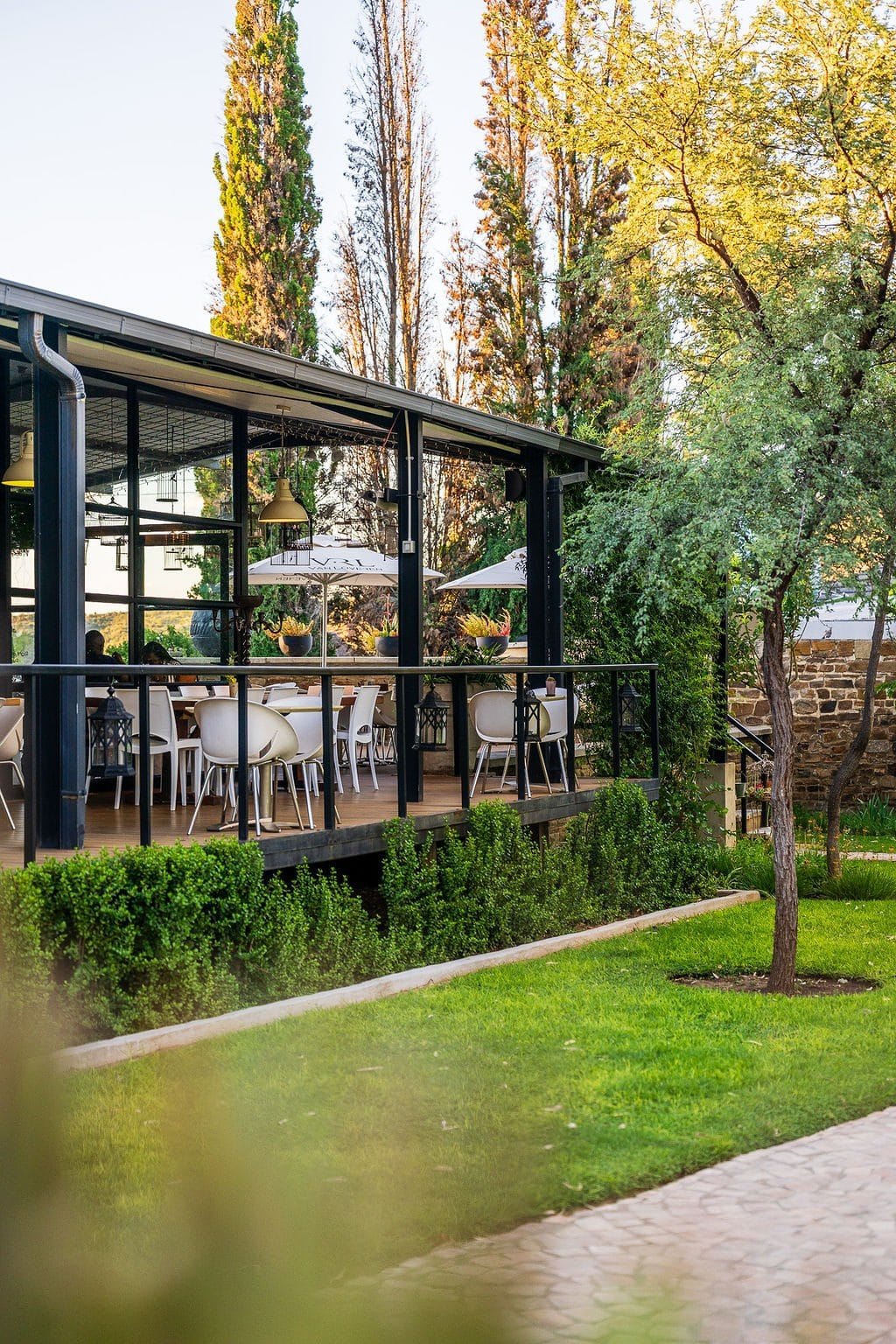 Birdcage Restaurant deck seen through the garden