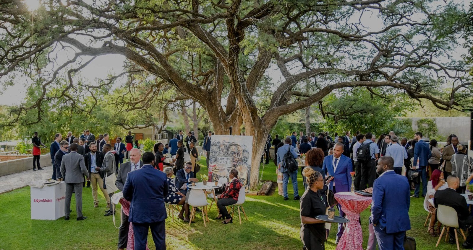 Delegates networking beneath the camelthorn trees at Droombos Estate
