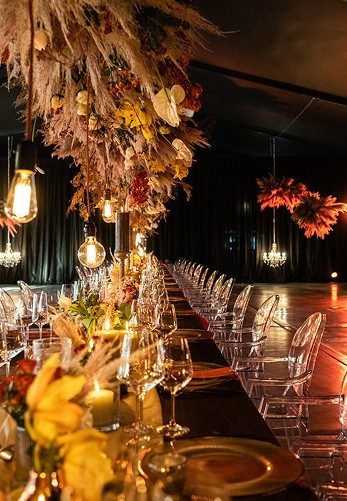 Dried flower installation over a long table