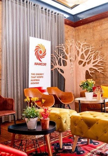 Lounge setup in the rammed earth hall