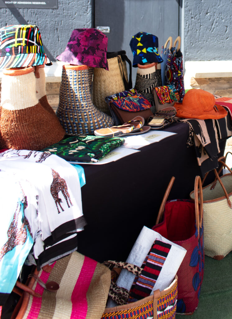 Handmade hats, woven baskets and printed textiles at a previous Droombos market